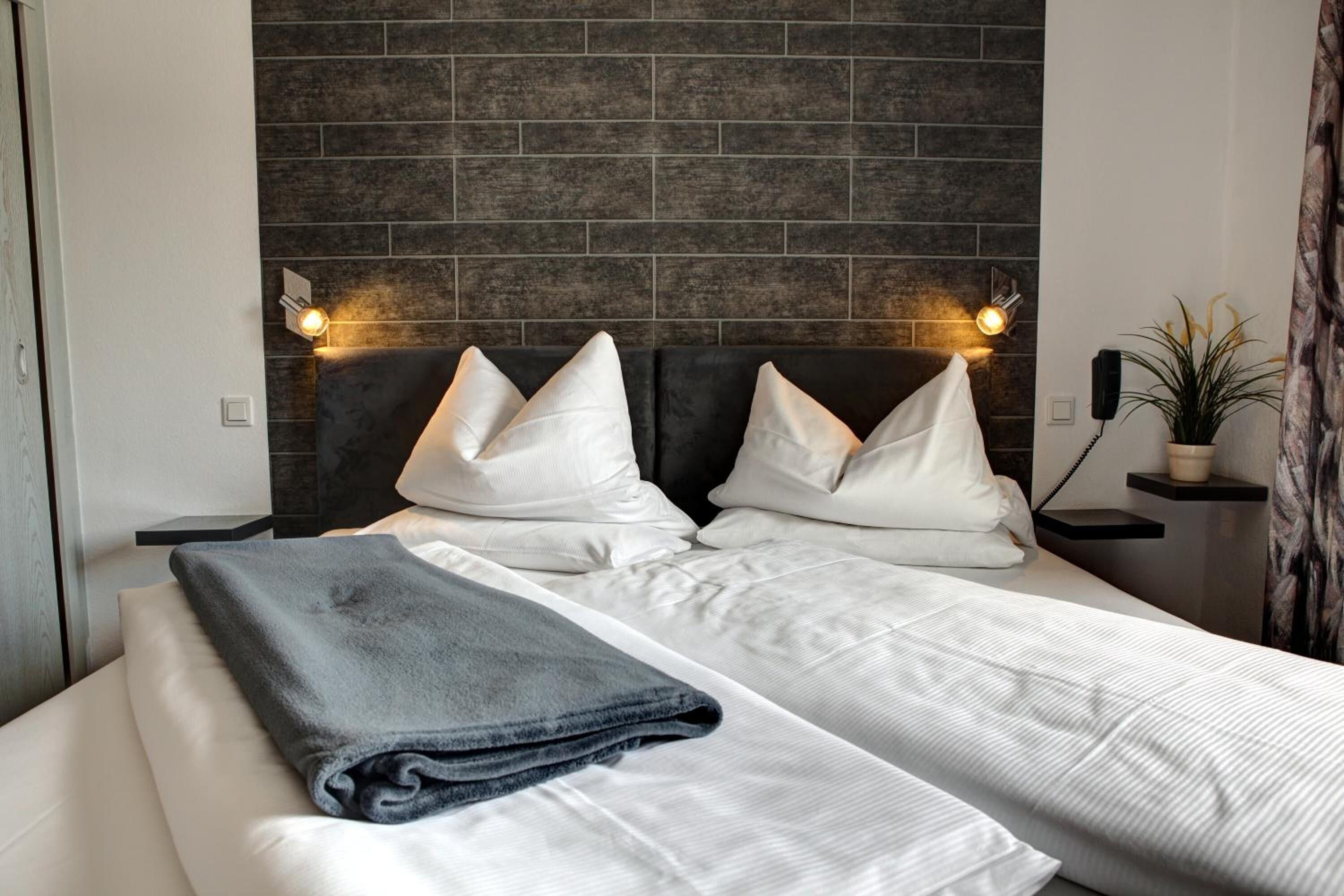 hypo-allergenic bedding, minibar, rollaway beds, free wifi