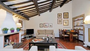 Apartment, 1 Bedroom | Living area | Flat-screen TV