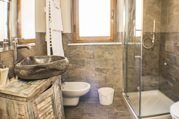 Exclusive Double Room, 1 King Bed | Bathroom | Shower, rainfall showerhead, free toiletries, hair dryer