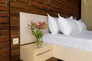 Habitación doble Deluxe, 1 cama King size | Cortinas blackout, wifi gratis y ropa de cama