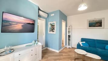 Suite Luxe, balcon, vue mer | Coin séjour