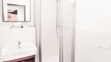 Shower, free toiletries, hair dryer, towels