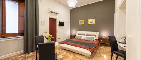 Deluxe Quadruple Room | In-room safe, desk, free WiFi, bed sheets