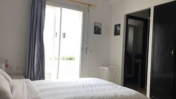 Basic Suite, 1 Bedroom | Individually furnished, blackout curtains, free WiFi, bed sheets