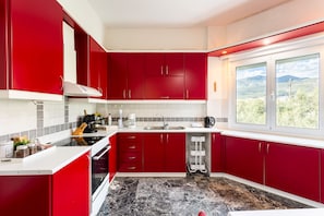 Full-sized fridge, oven, stovetop, dishwasher - Sunset Serenity - Kardamili Seaside Getaway (West Mani)