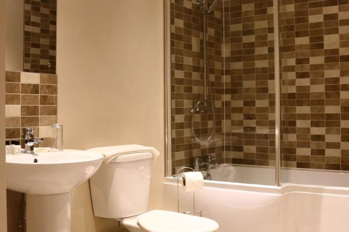 separate bathtub and shower, free toiletries, hair dryer, heated floors