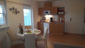 Fridge, microwave, dishwasher, coffee/tea maker