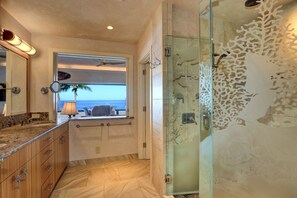 Shower, eco-friendly toiletries, hair dryer, towels