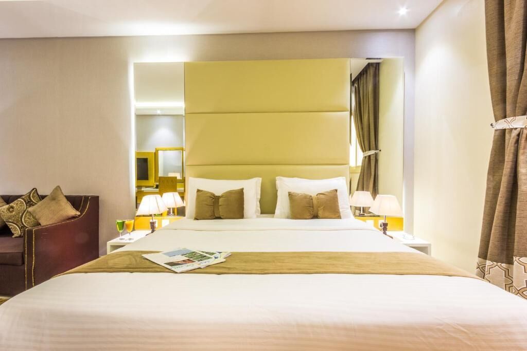 Deluxe Double Room, City View | In-room safe, iron/ironing board, free WiFi, bed sheets