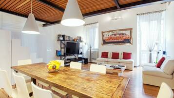 Apartment, 2 Bedrooms | Living area | Flat-screen TV, DVD player