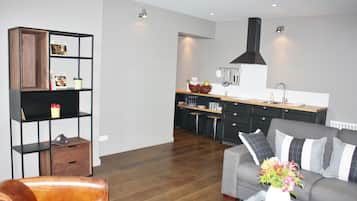 Apartment, 2 Bedrooms, Accessible (Le City) | Living area | Flat-screen TV