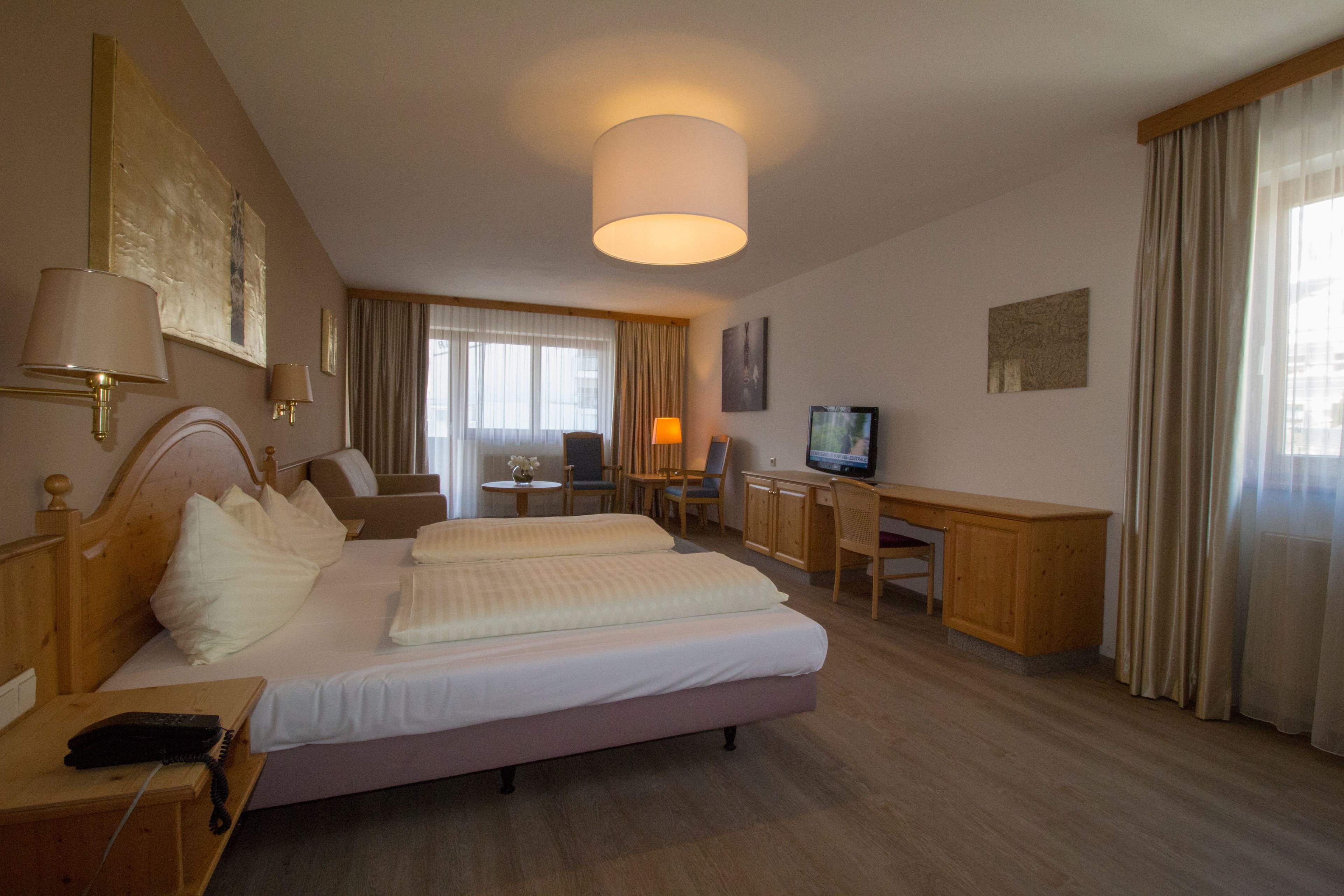 junior suite | in-room safe, desk, blackout curtains, soundproofing