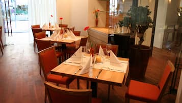 Breakfast, lunch, dinner served; local and international cuisine