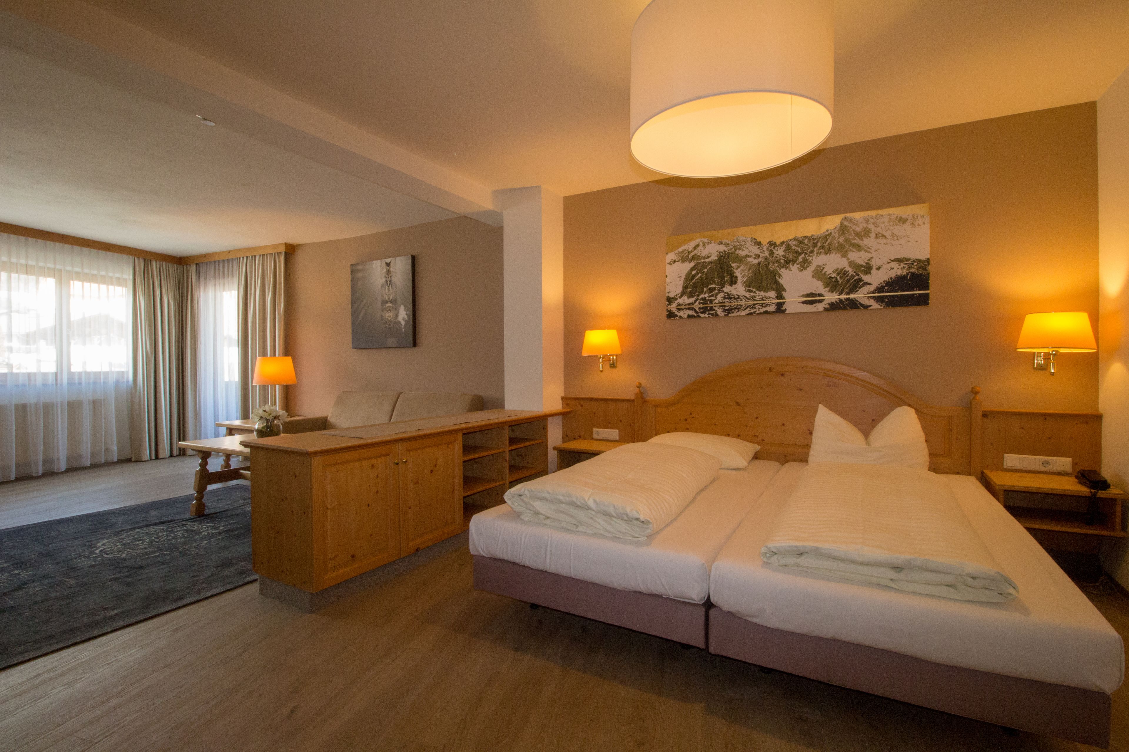 junior suite | in-room safe, desk, blackout curtains, soundproofing