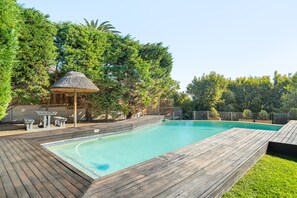 Outdoor pool, pool umbrellas, pool loungers