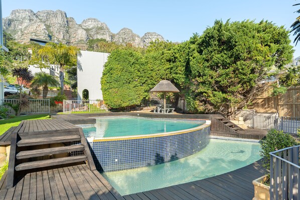 Outdoor pool, pool umbrellas, pool loungers