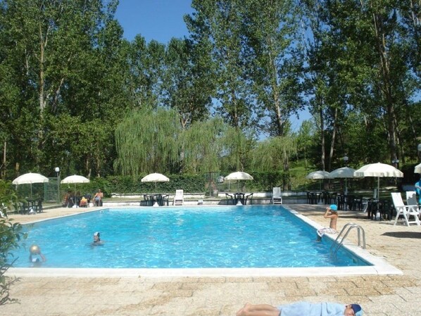 Outdoor pool, pool umbrellas, pool loungers