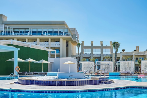 2 outdoor pools, pool umbrellas, sun loungers