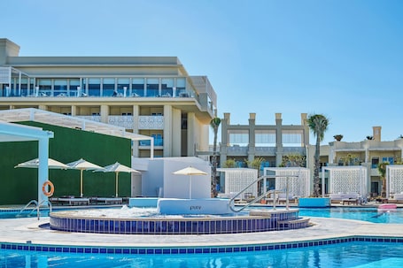2 outdoor pools, pool umbrellas, sun loungers