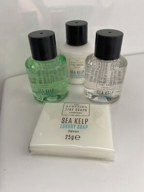 Four bottles of sea kelp products from The Scottish Fine Soaps Company, including a 25g luxury soap bar.