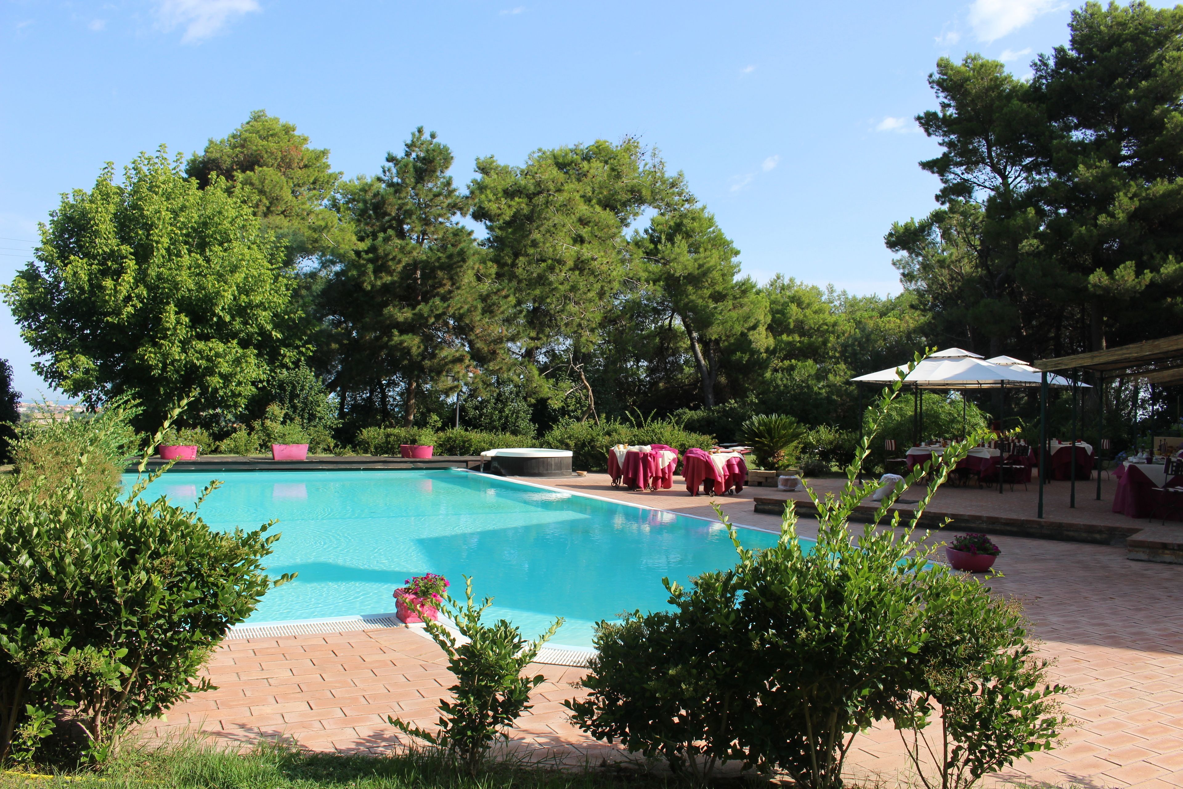 Seasonal outdoor pool, open 8:00 AM to 7:00 PM, pool loungers