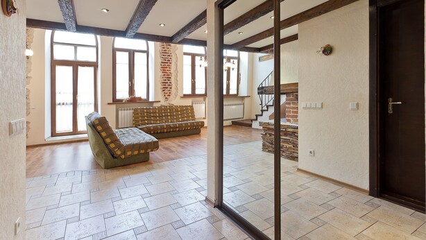 Deluxe appartement | Woonruimte | Lcd-televisie en een open haard