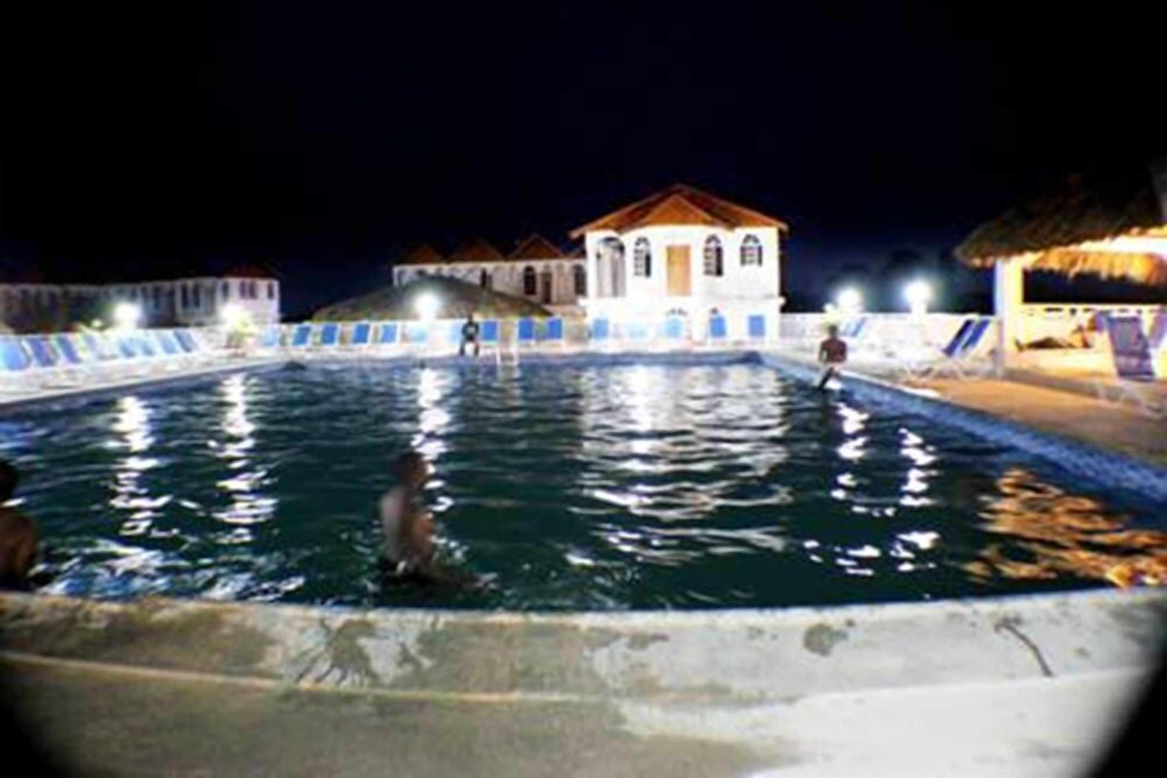 Outdoor pool, open 10 AM to 10 PM, pool umbrellas, sun loungers