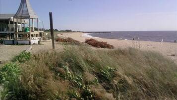 Beach nearby, sun loungers