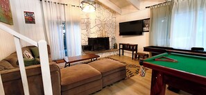 Smart TV, fireplace, table football, ping pong