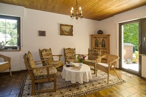 Family House, 4 Bedrooms | Living area | Flat-screen TV, DVD player, ping pong - Ferienhaus Faltmann (Heimbach)