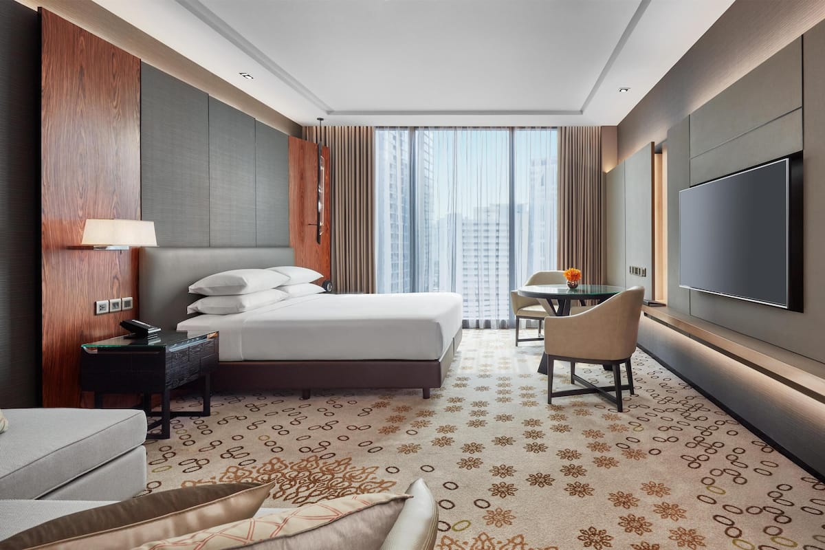 Chambre Deluxe, 1 trĂšs grand lit | Minibar, coffres-forts dans les chambres, bureau, rideaux occultants