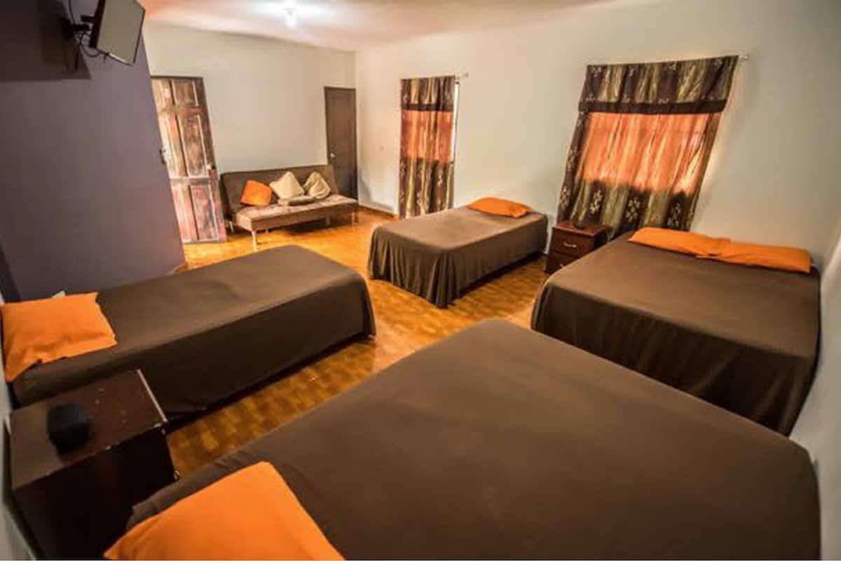 Family Room, Multiple Beds, Non Smoking, Beach View (2 Double and 2 Single Beds) | Iron/ironing board, free WiFi