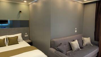 Deluxe kamer, 2 slaapkamers | 1 slaapkamer, luxe beddengoed, Select Comfort-bedden, een bureau