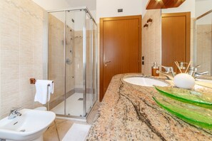 Shower, hair dryer, bathrobes, bidet