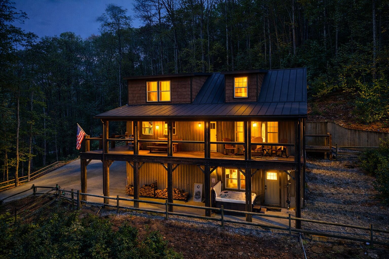 A two-story wooden cabin with a balcony, a flag, and a fireplace.