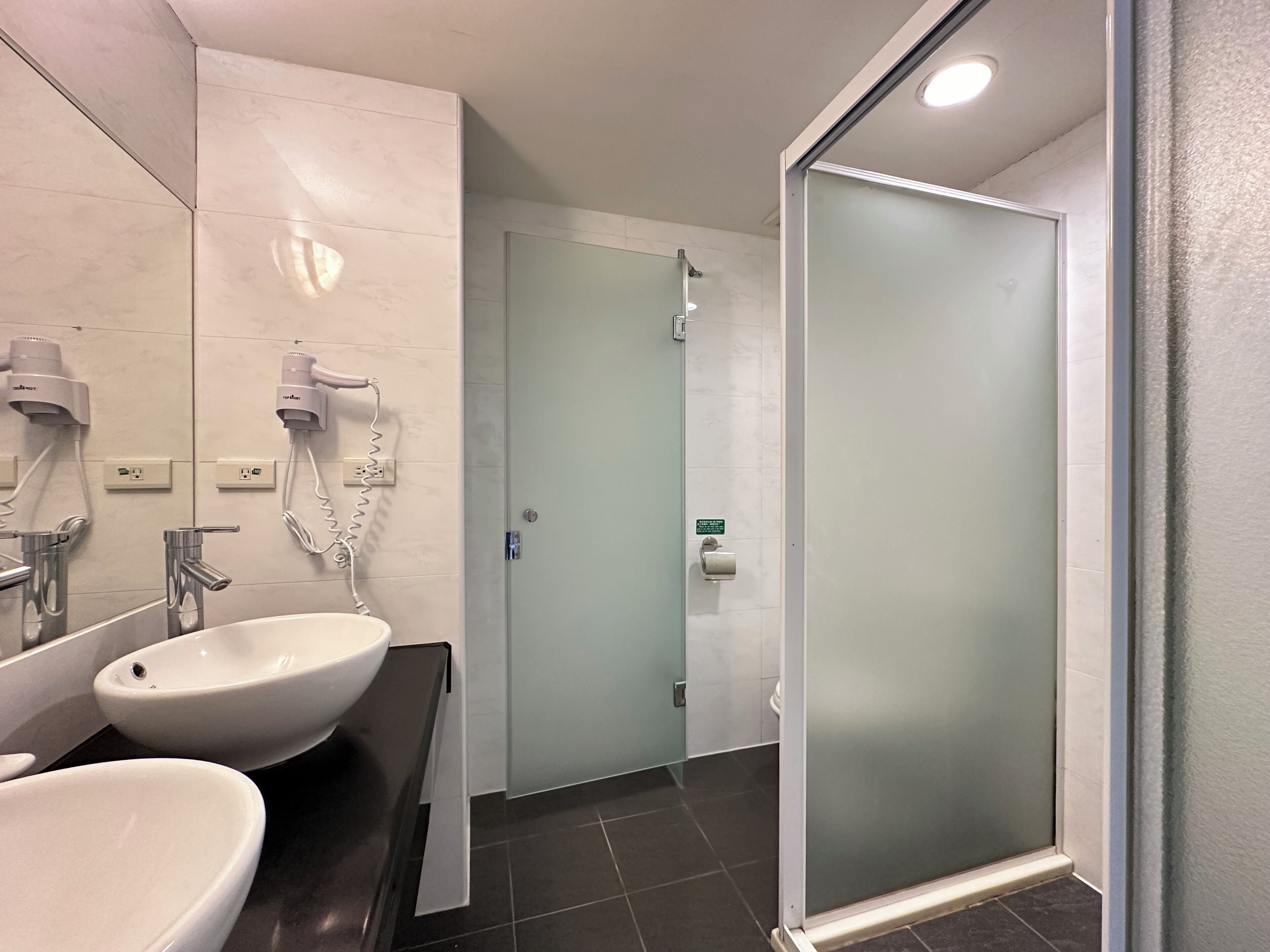 standard quadruple room | bathroom | shower, free toiletries, hair dryer, slippers