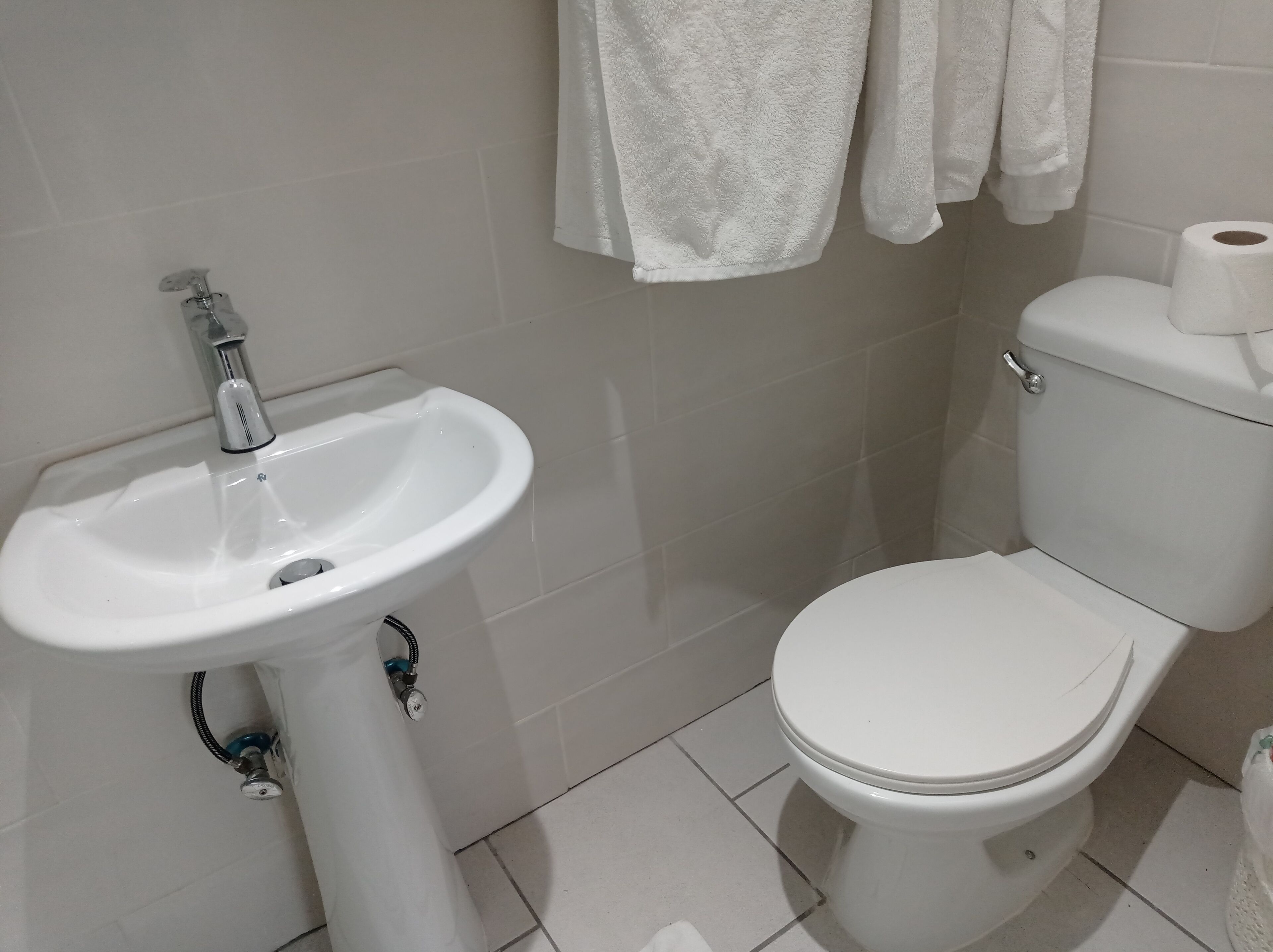 classic double room, multiple beds, balcony, pool view | bathroom | shower, rainfall showerhead, free toiletries, towels