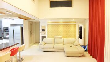 Family House, 3 Bedrooms | Living area | Flat-screen TV