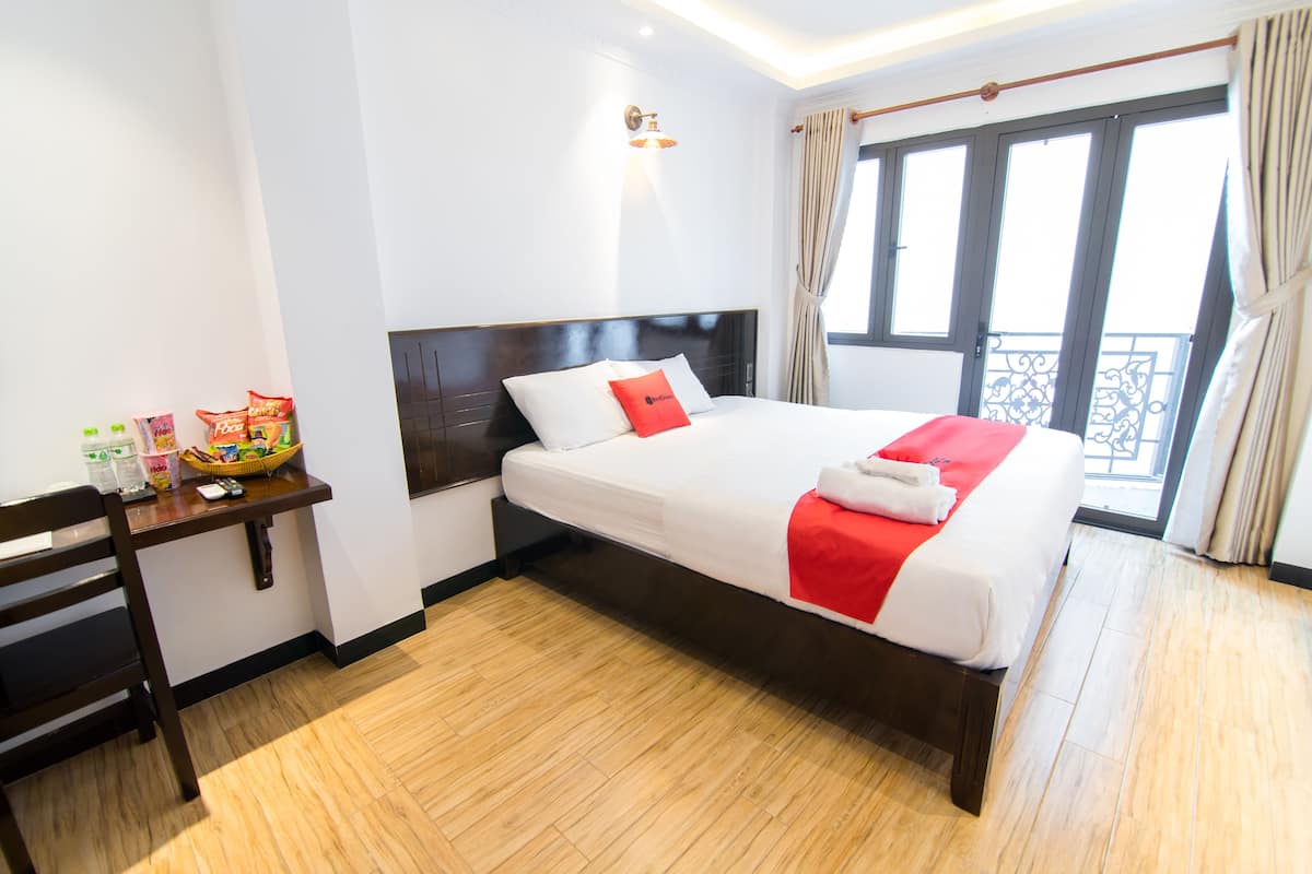 Deluxe tweepersoonskamer | Een minibar, een bureau, gratis wifi, beddengoed