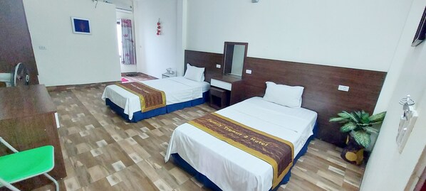 Standaard Twin kamer | Een minibar, individueel gedecoreerd, individueel gemeubileerd