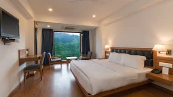 Premium Double Room, 1 King Bed, Non Smoking | Premium bedding, desk, laptop workspace, blackout curtains