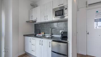 Fridge, microwave, coffee/tea maker, electric kettle