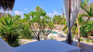 Deluxe Bungalow, 1 Queen Bed, Pool View, Garden Area | View from room