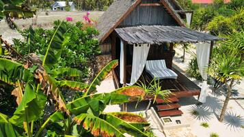 Deluxe Bungalow, 1 Queen Bed, Pool View, Garden Area | 1 bedroom, premium bedding, in-room safe, desk