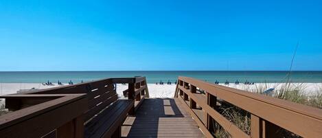On the beach, sun-loungers, beach towels