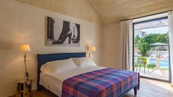 Deluxe Room, 1 Queen Bed, Non Smoking, Pool View | Premium bedding, down comforters, memory foam beds, desk