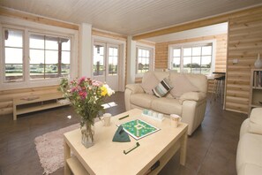 House, 3 Bedrooms, Lake View | Living room | Flat-screen TV