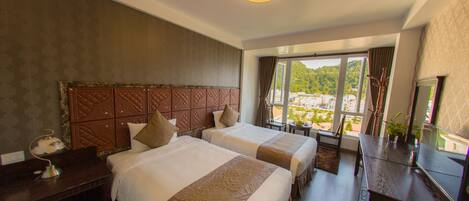 Deluxe Triple Room, Mountain View | In-room safe, desk, blackout drapes, free WiFi