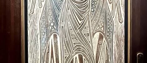 A door with a detailed etched design.