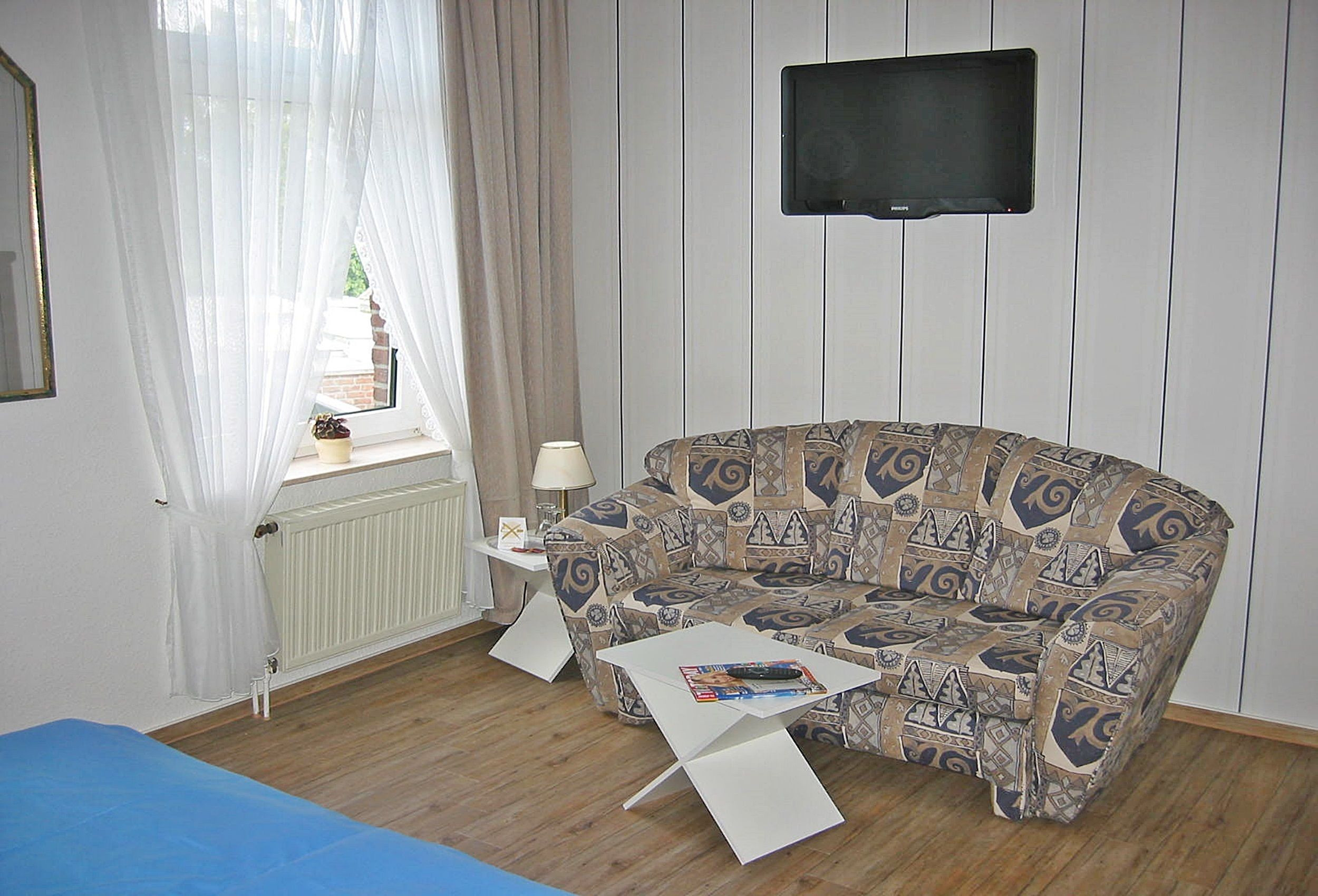 double room, 1 double bed with sofa bed | living area | flat-screen tv